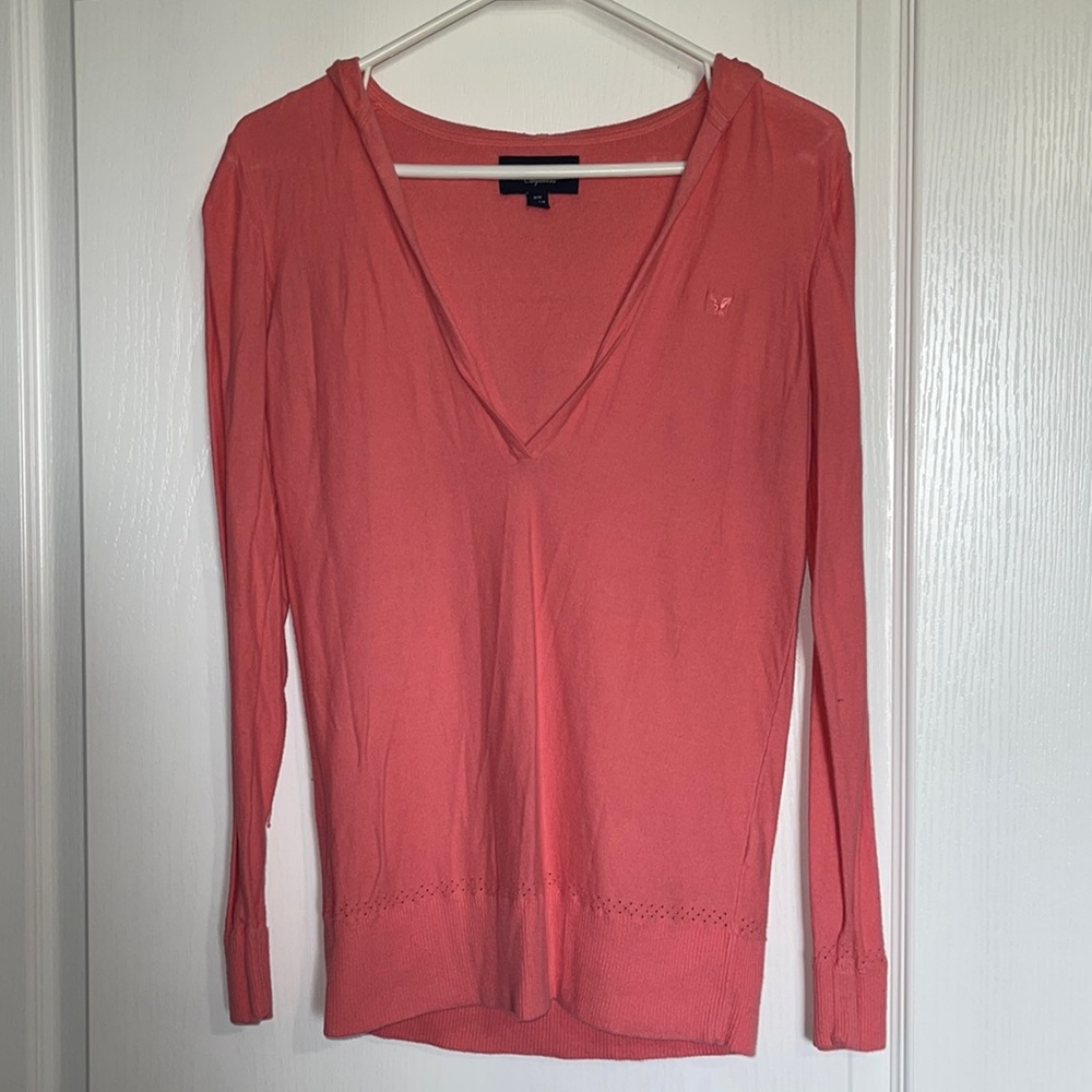 Women’s M coral American Eagle hooded sweater.